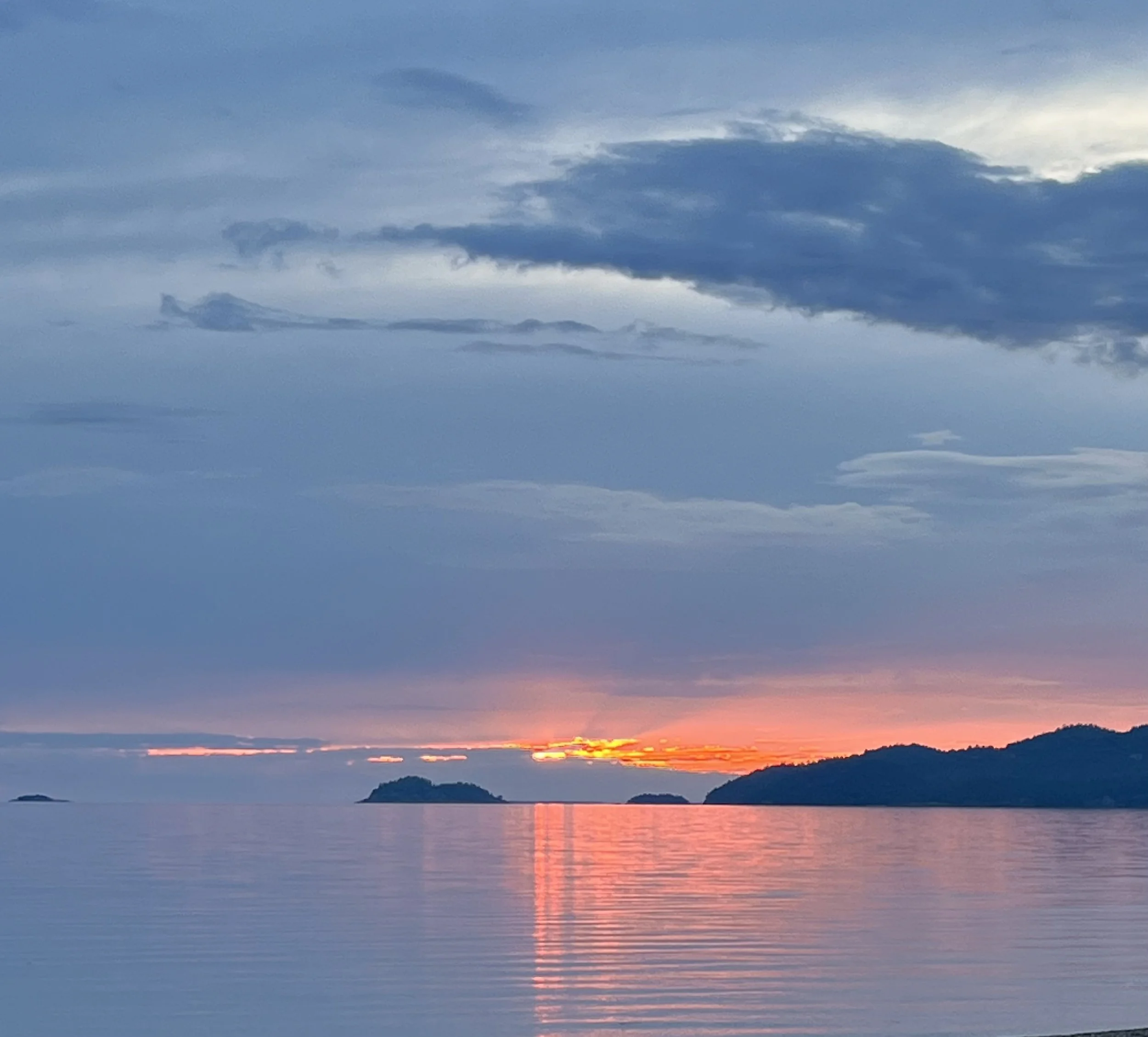 A calm sunset over Georgian Bay, where Amy Tremblay offers couples retreats and intensives.