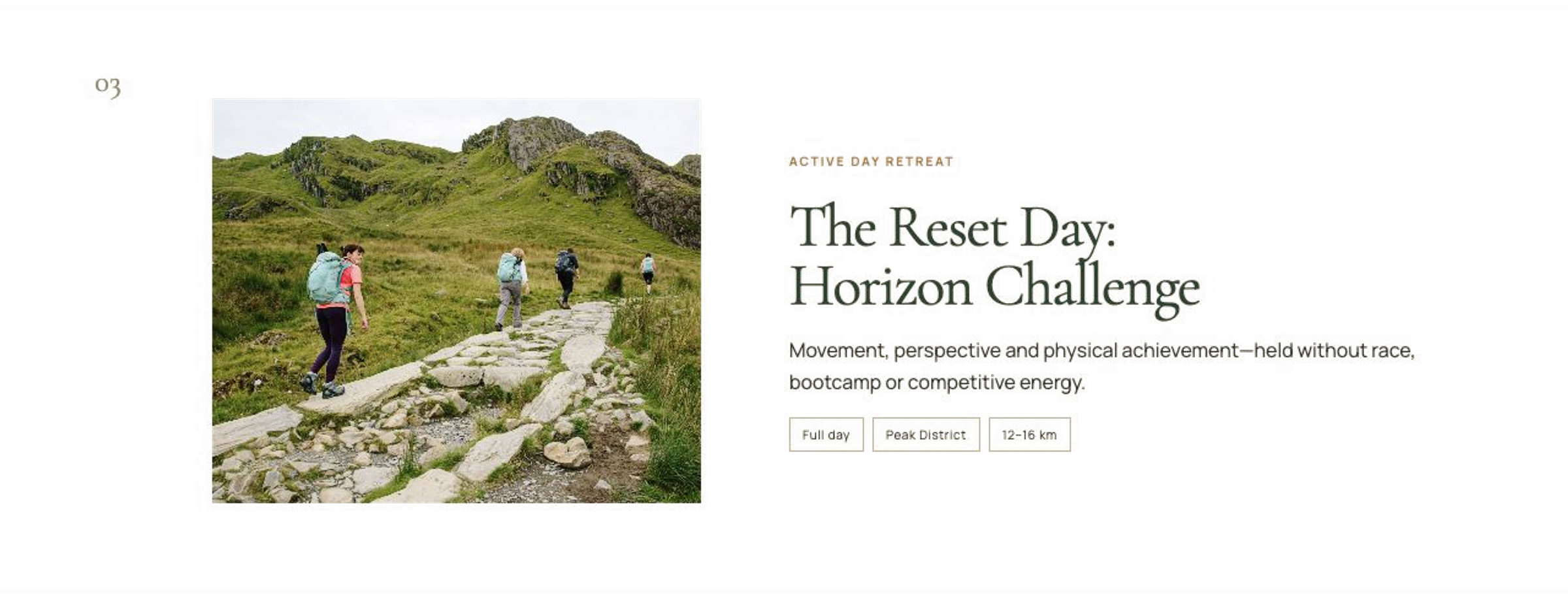 Hiking trail in a green mountainous landscape with five hikers walking along a stone path.