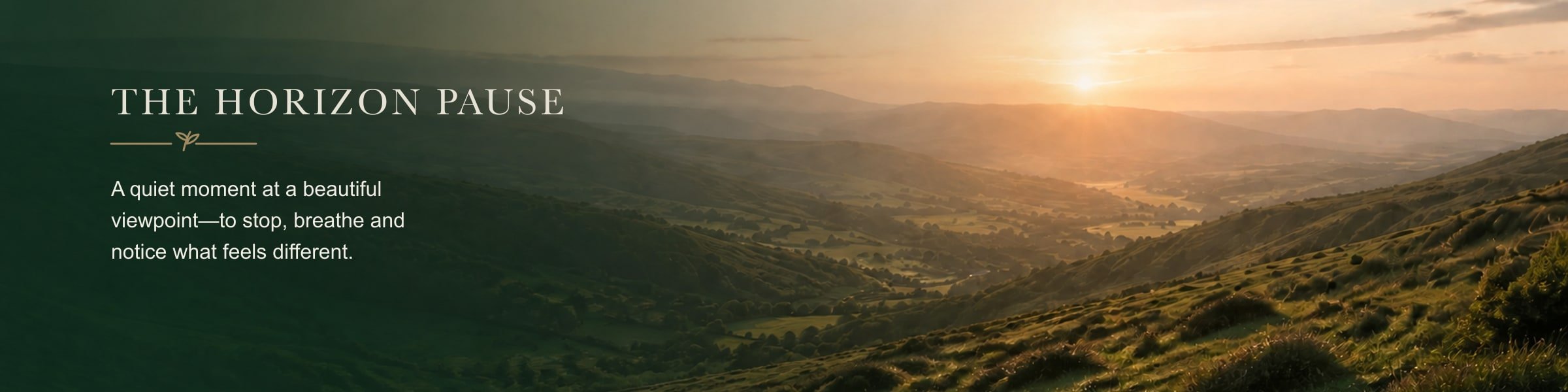Sunset over rolling green hills in a valley with a peaceful atmosphere.