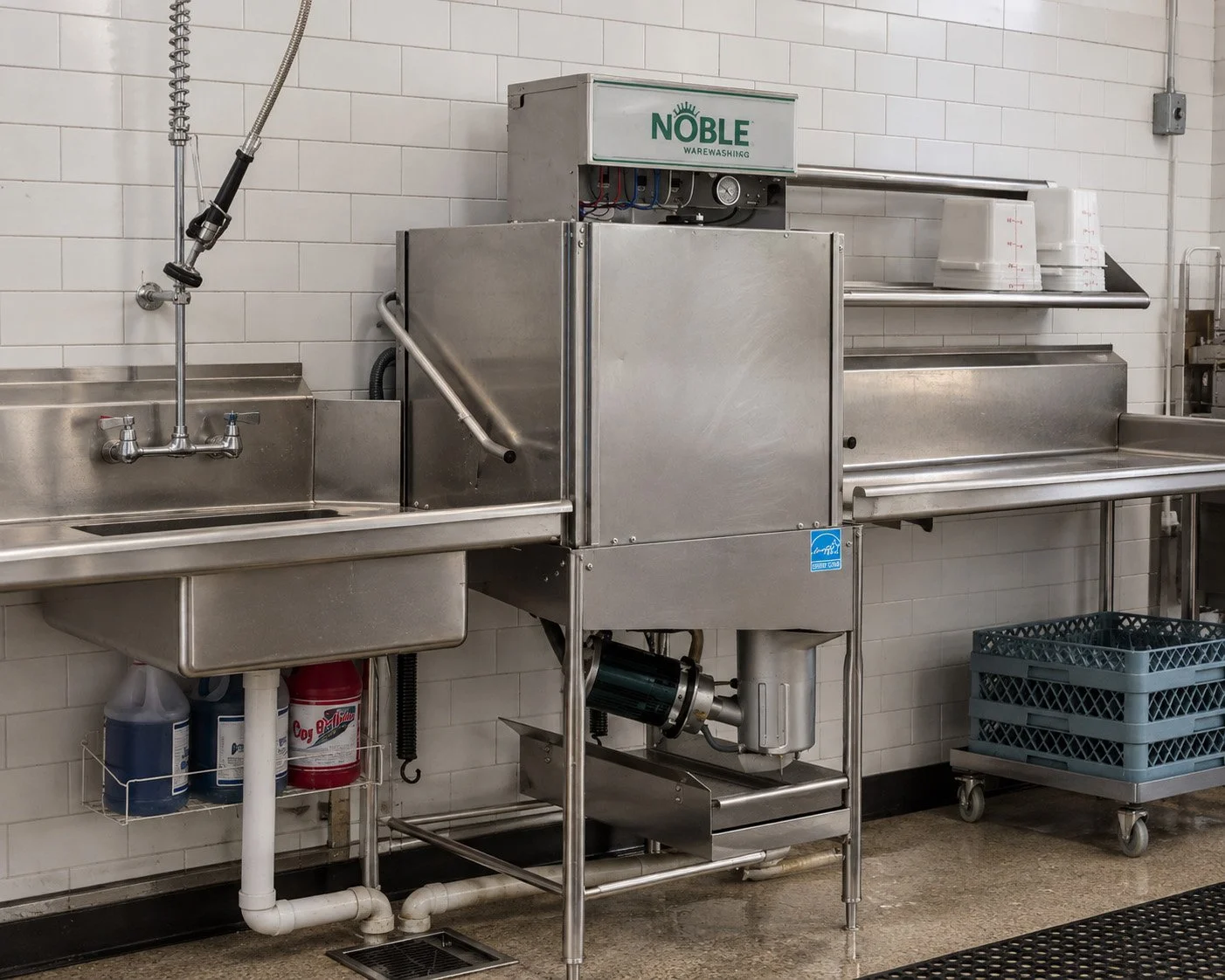 Commercial dishwasher in a commercial kitchen.