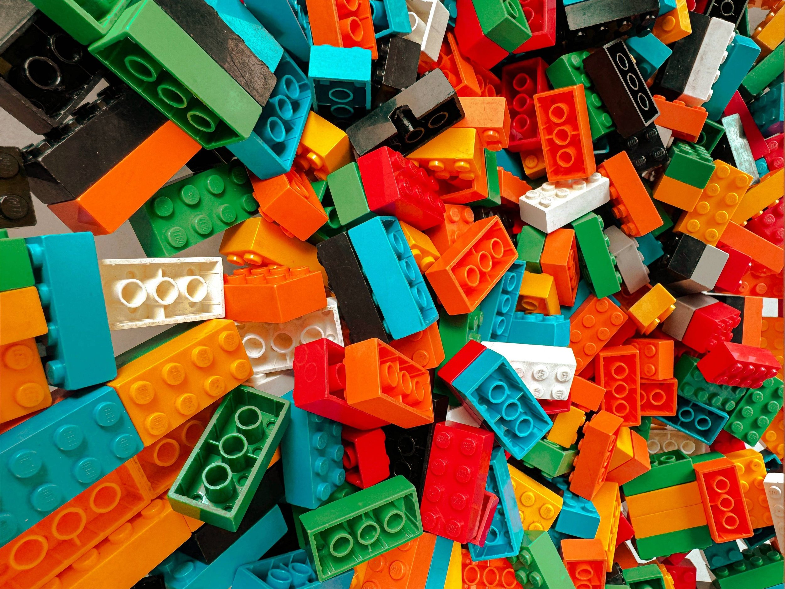Lego blocks of different colors and shapes.