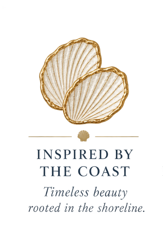 Two scallop shells above the text 'Inspired by the coast' and 'Timeless beauty rooted in the shoreline'.