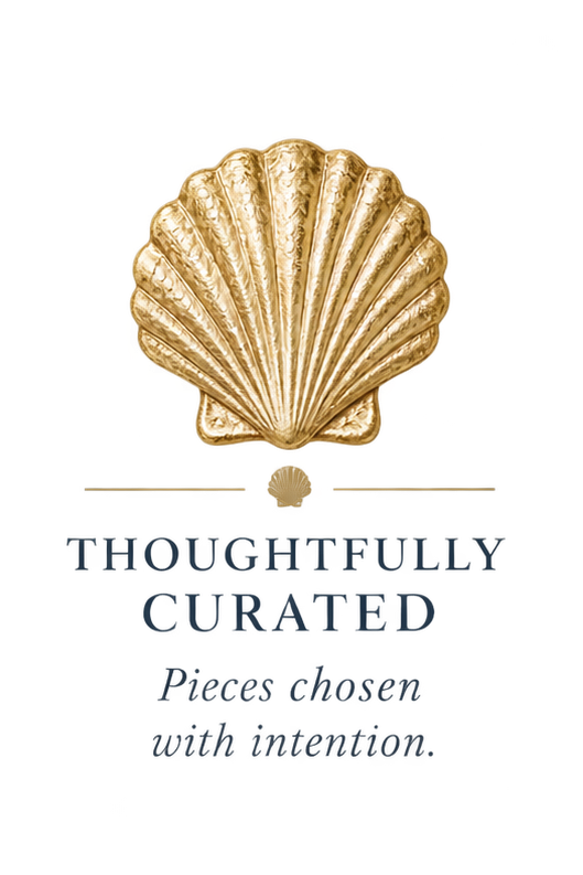 Logo with a gold seashell above the text 'Thoughtfully Curated' and the tagline 'Pieces chosen with intention.'