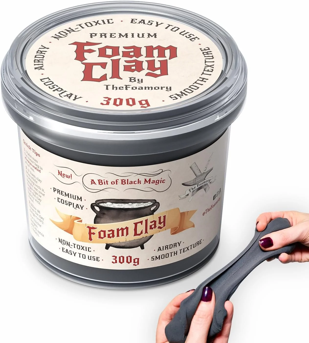 Container of foam clay with a person holding a tool to mold it.