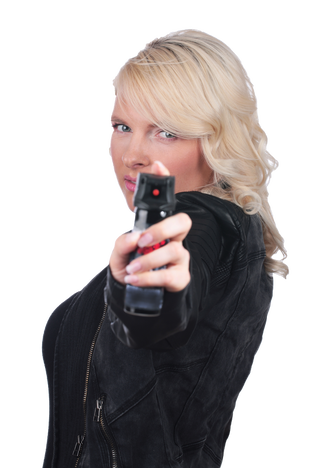 A woman with blonde hair, wearing a black leather jacket, pointing a gun directly at the camera.