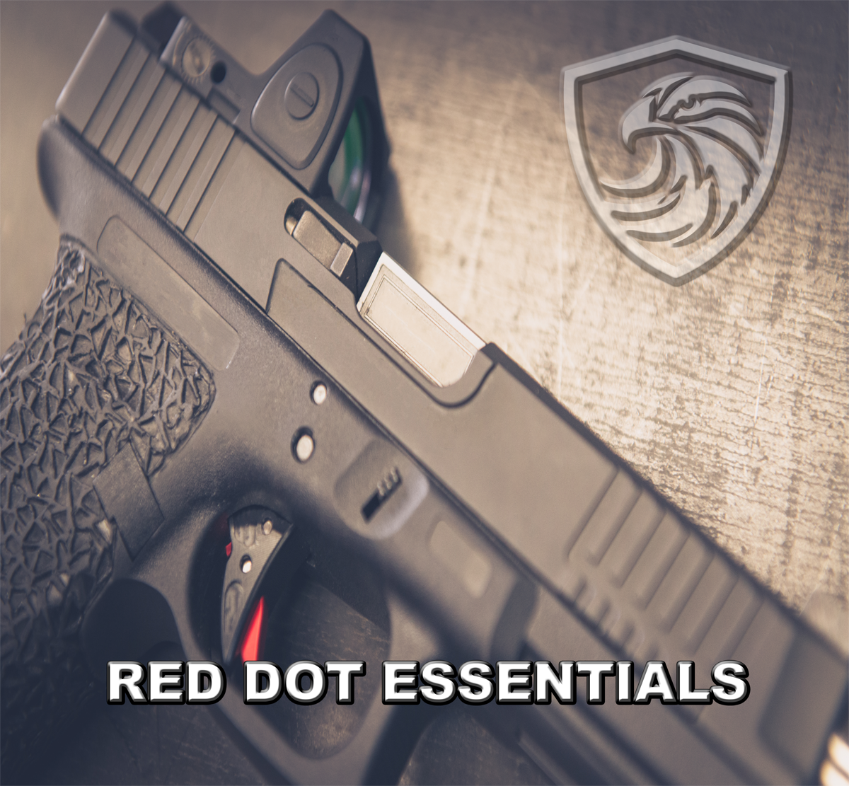 A Glock handgun with a loaded magazine inserted, placed on a wooden surface with a lion emblem logo in the background, and the text 'RED DOT ESSENTIALS' at the bottom.