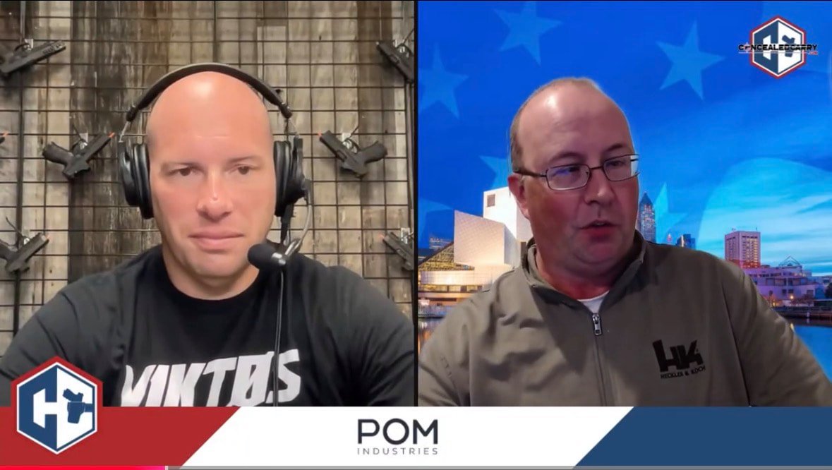 Two men are participating in a video call or interview, one on the left wearing headphones with a microphone, and the other on the right with glasses, set against different backgrounds including a cityscape or blue backdrop.