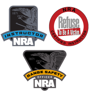 Three NRA badges related to safety and instruction, including 'Instructor', 'Refuse To Be A Victim', and 'Range Safety Officer' badges.