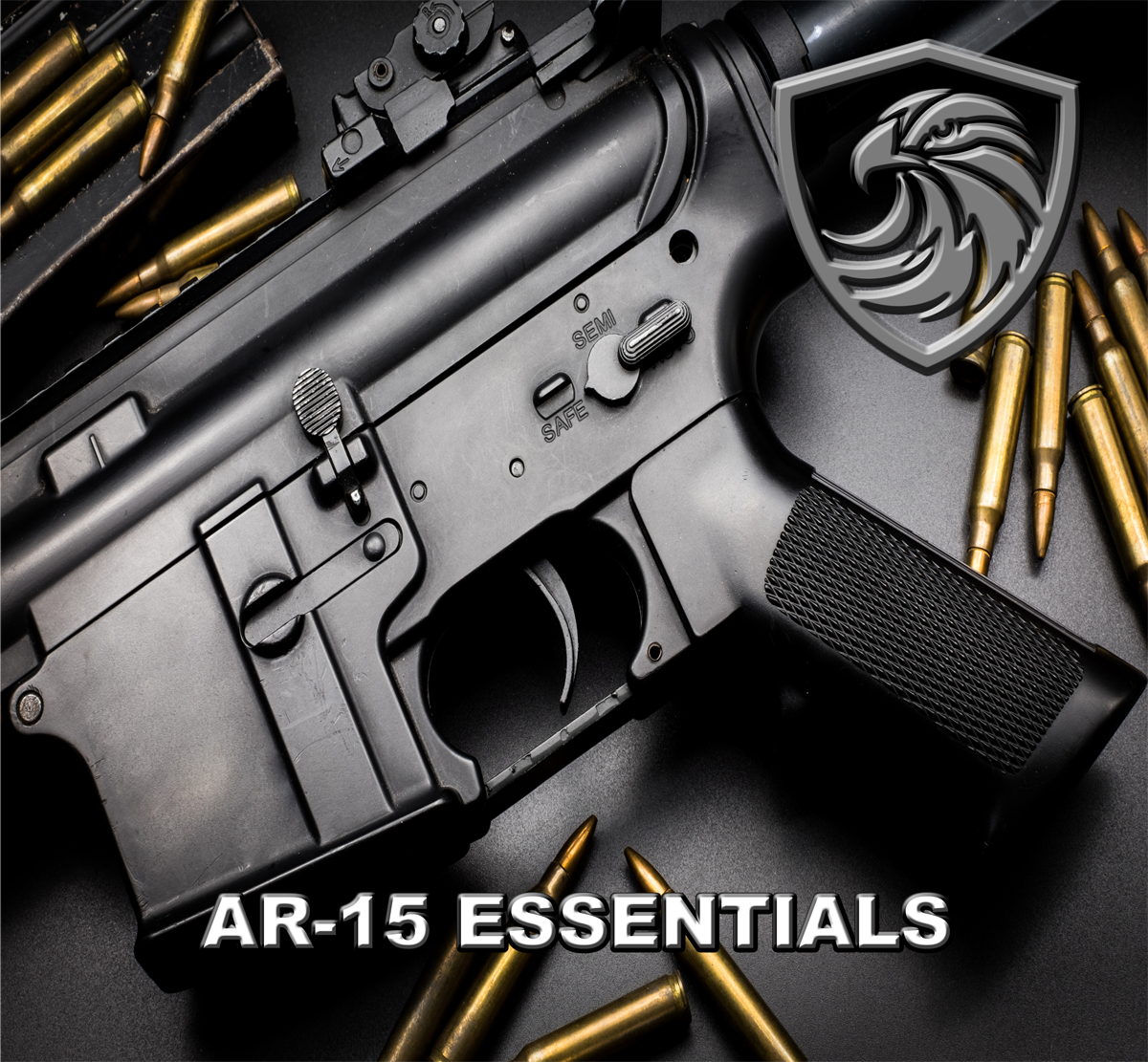 A black AR-15 semi-automatic rifle with gold bullets scattered around it, and a silver and black emblem with a stylized eagle head in a shield shape on the upper right corner. Text at the bottom reads "AR-15 ESSENTIALS."