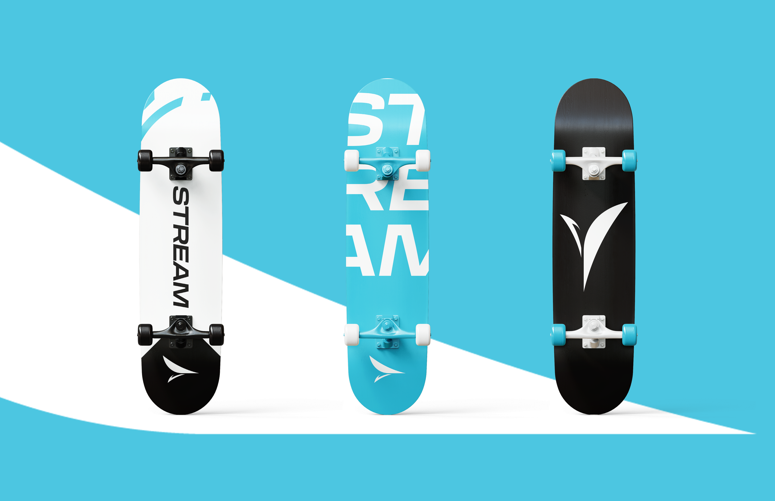Three skateboards standing upright against a blue background.