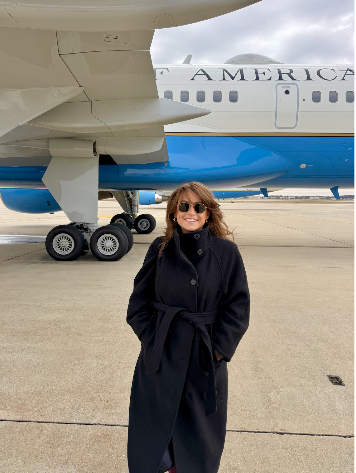 Mary Margaret Olohan smiles in front of Air Force Two at JBA.
