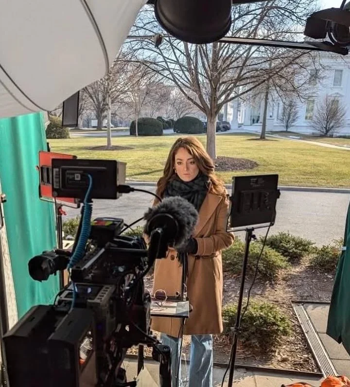 Mary Margaret Olohan does a television interview in front of the White House.