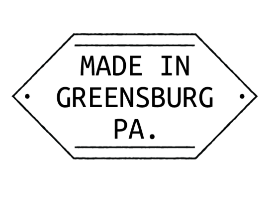 Black octagon-shaped sign with white text that reads "STOP" in the center.