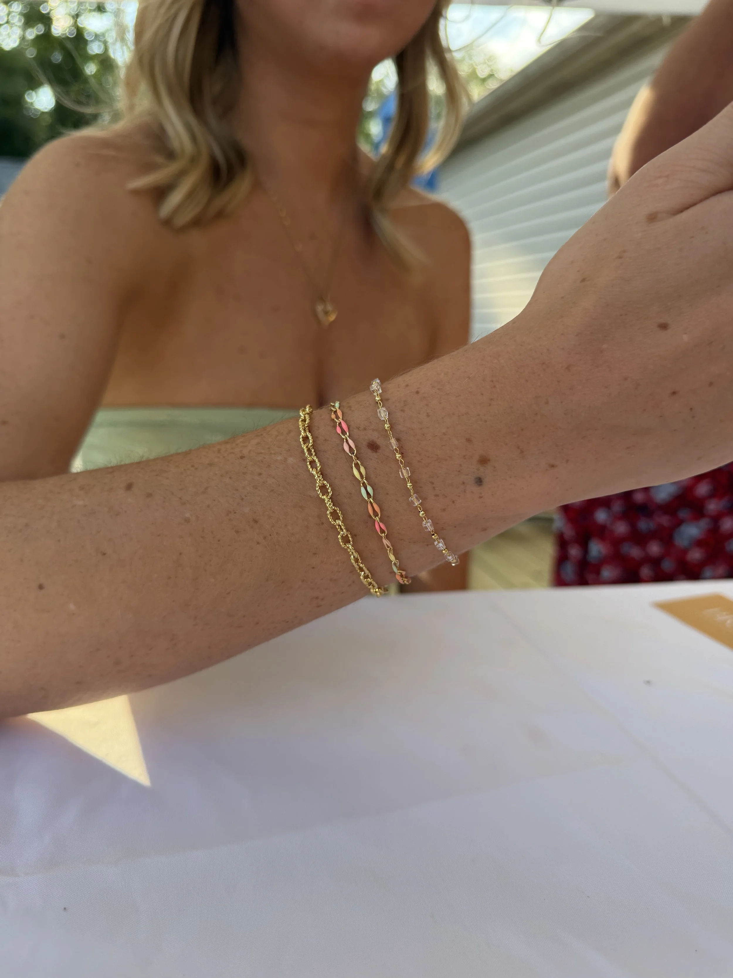 Permanent jewelry by Braze Permanent Jewelry in Broomall, PA, offering custom bracelets, anklets, necklaces, hand chains, charms, private parties and pop-up events.