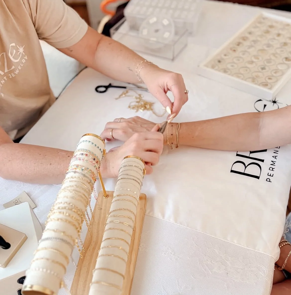 Permanent jewelry by Braze Permanent Jewelry in Broomall, PA, offering custom bracelets, anklets, necklaces, hand chains, charms, private parties and pop-up events.