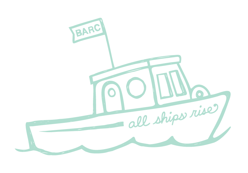 A simple line drawing of a boat with a flag that reads 'BARC' and the words 'all ships rise' on the hull, sailing on water.
