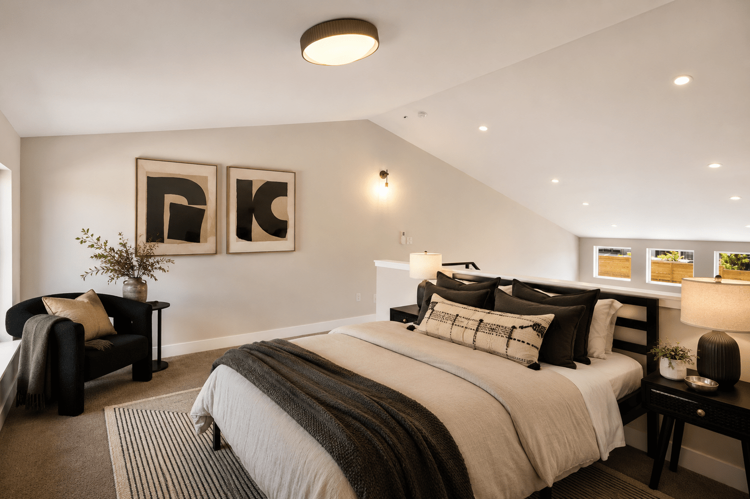 Bedroom under a vaulted ceiling