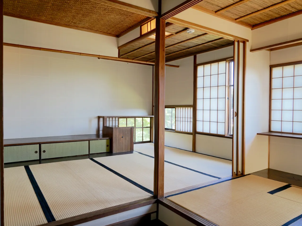 Open interior of Chochikukyo House with interconnected Japanese rooms