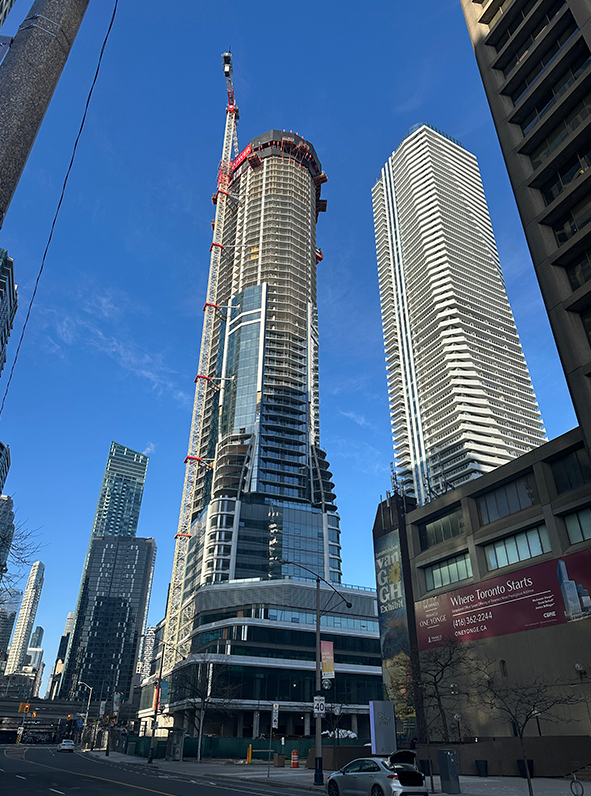 SkyTower at Pinnacle One Yonge rising above downtown Toronto during construction