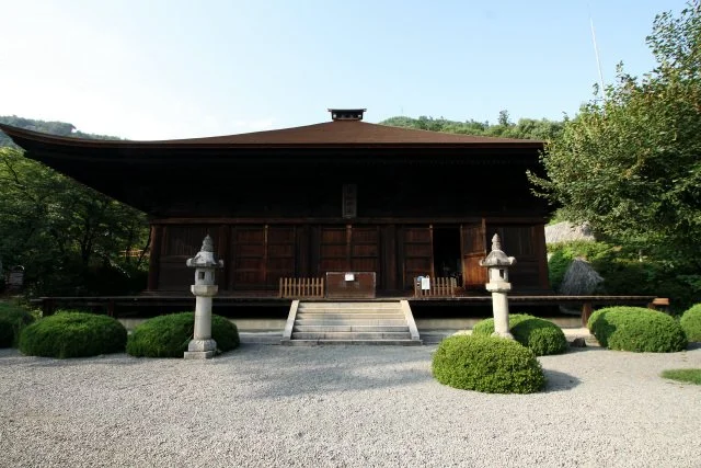 Weathered timber exterior of a traditional Japanese temple