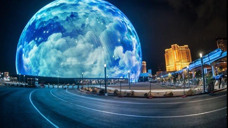 Las Vegas Sphere illuminated at night with its massive LED Exosphere