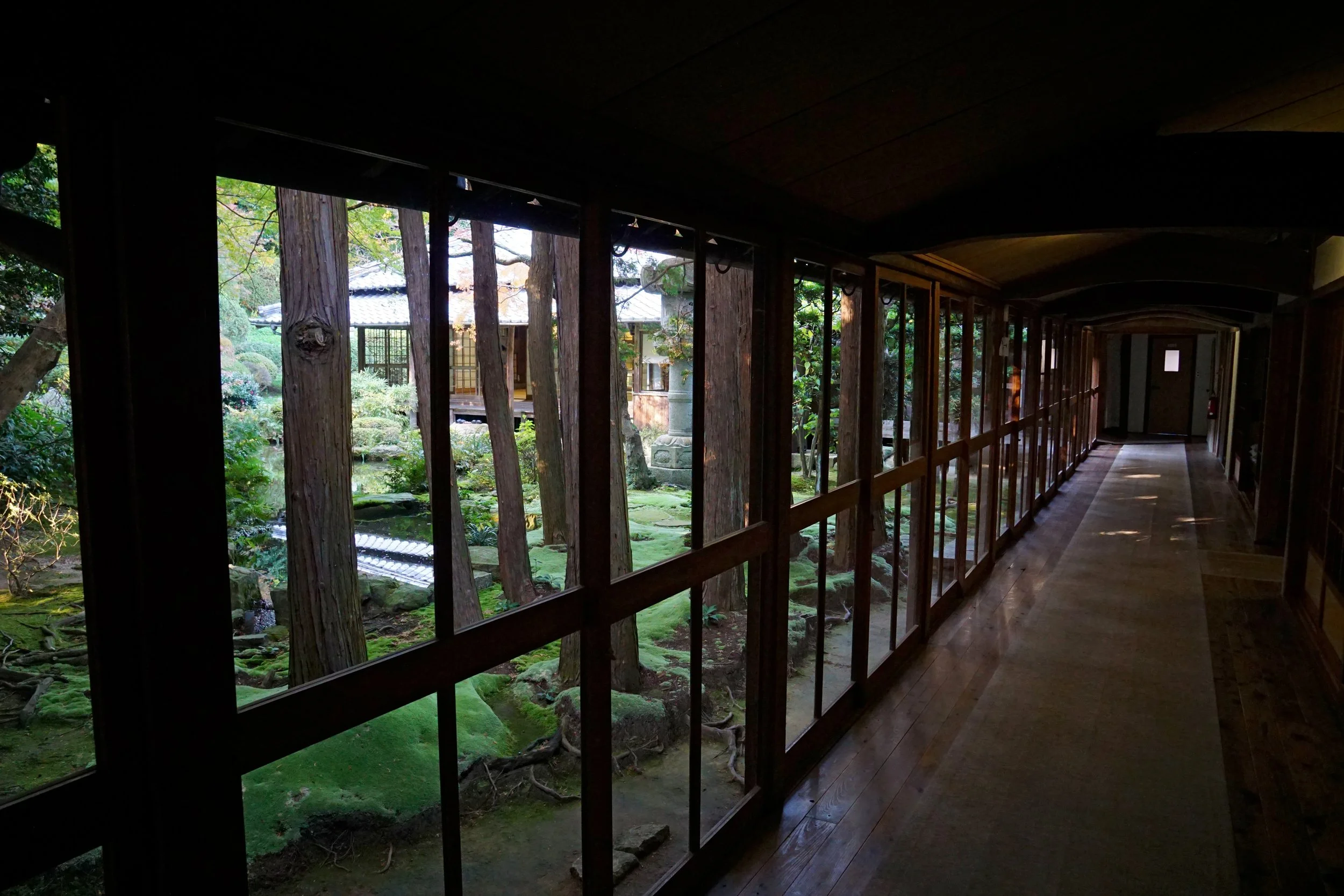 Traditional Japanese engawa connecting a wooden house with the surrounding garden