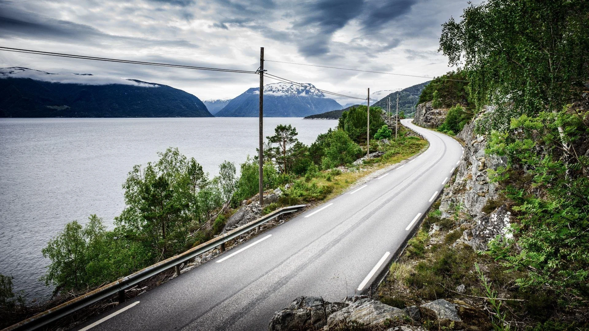 Norway’s E39 highway passing through the mountainous and fjord-dominated landscape of the country’s western coast.