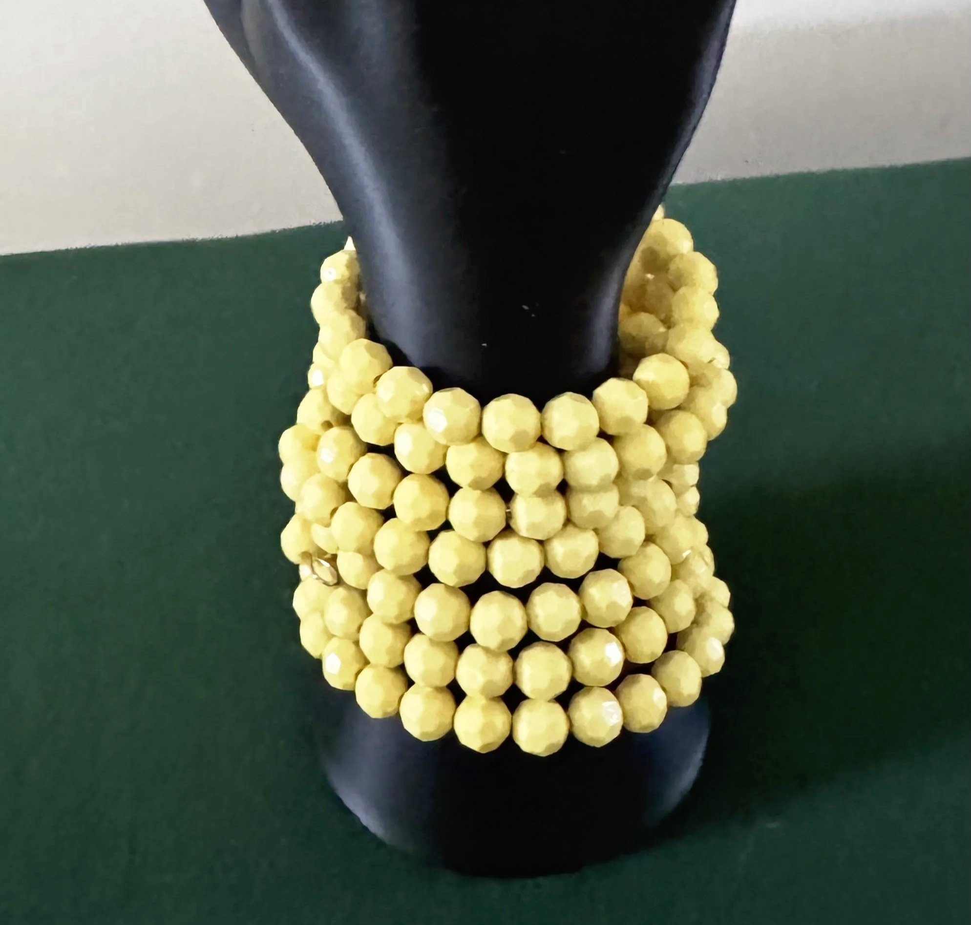 hand+with+yellow+bracelets.jpg