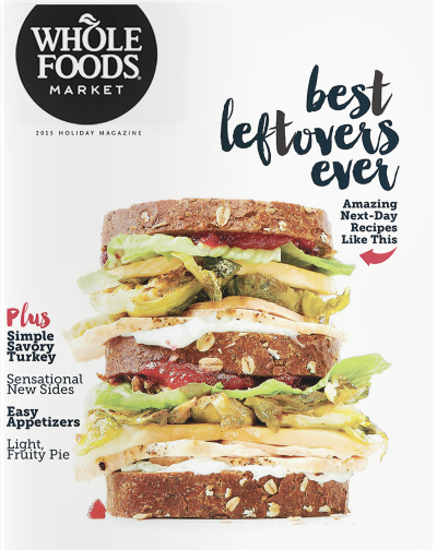A magazine cover from Whole Foods Market, titled "Best leftovers ever," featuring a large, multi-layered turkey sandwich with various fillings including lettuce, turkey slices, and other deli meats on whole grain bread.