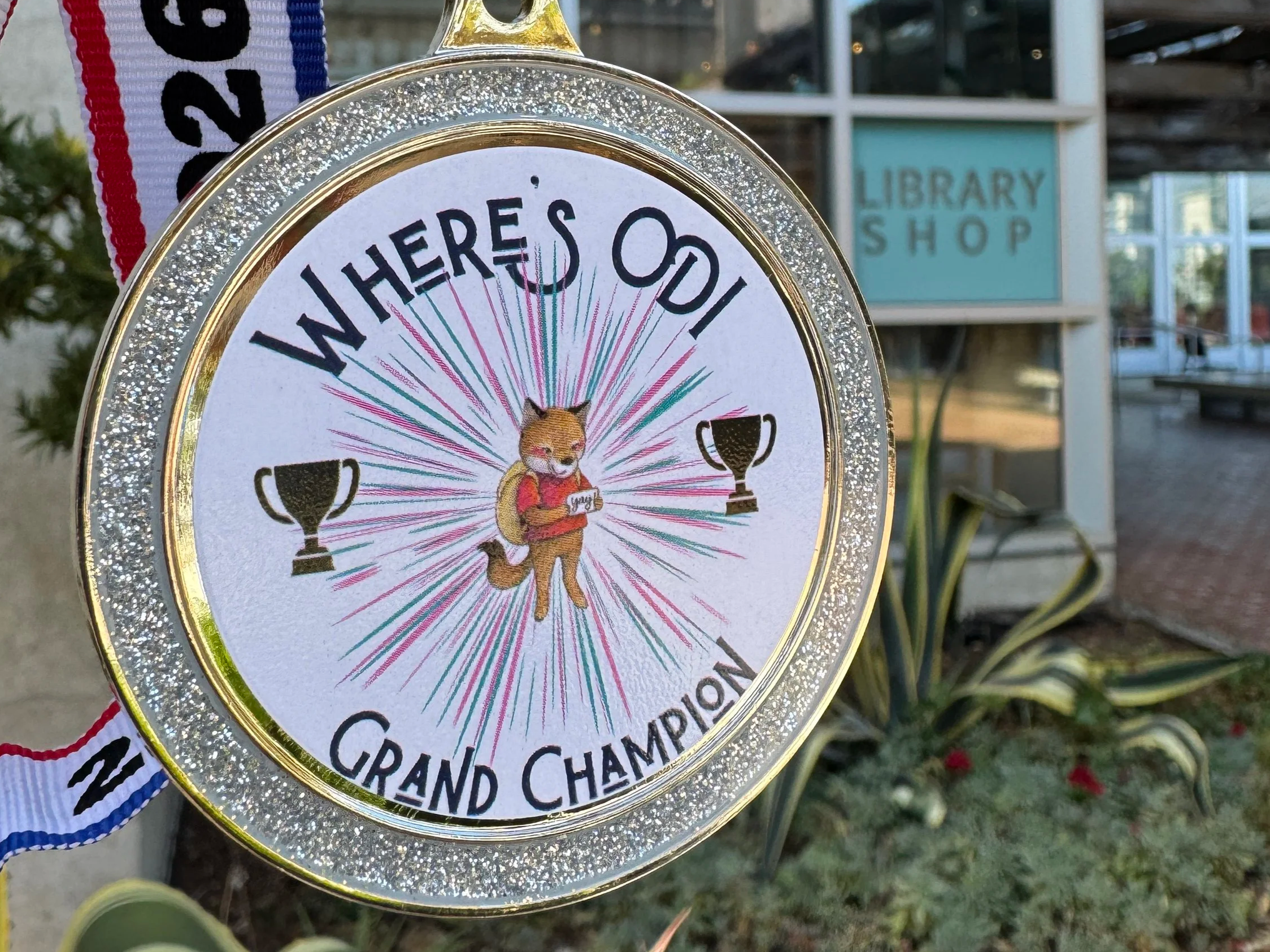Where's Odi? Grand Champion medallion in front of the Library Shop in downtown San Diego