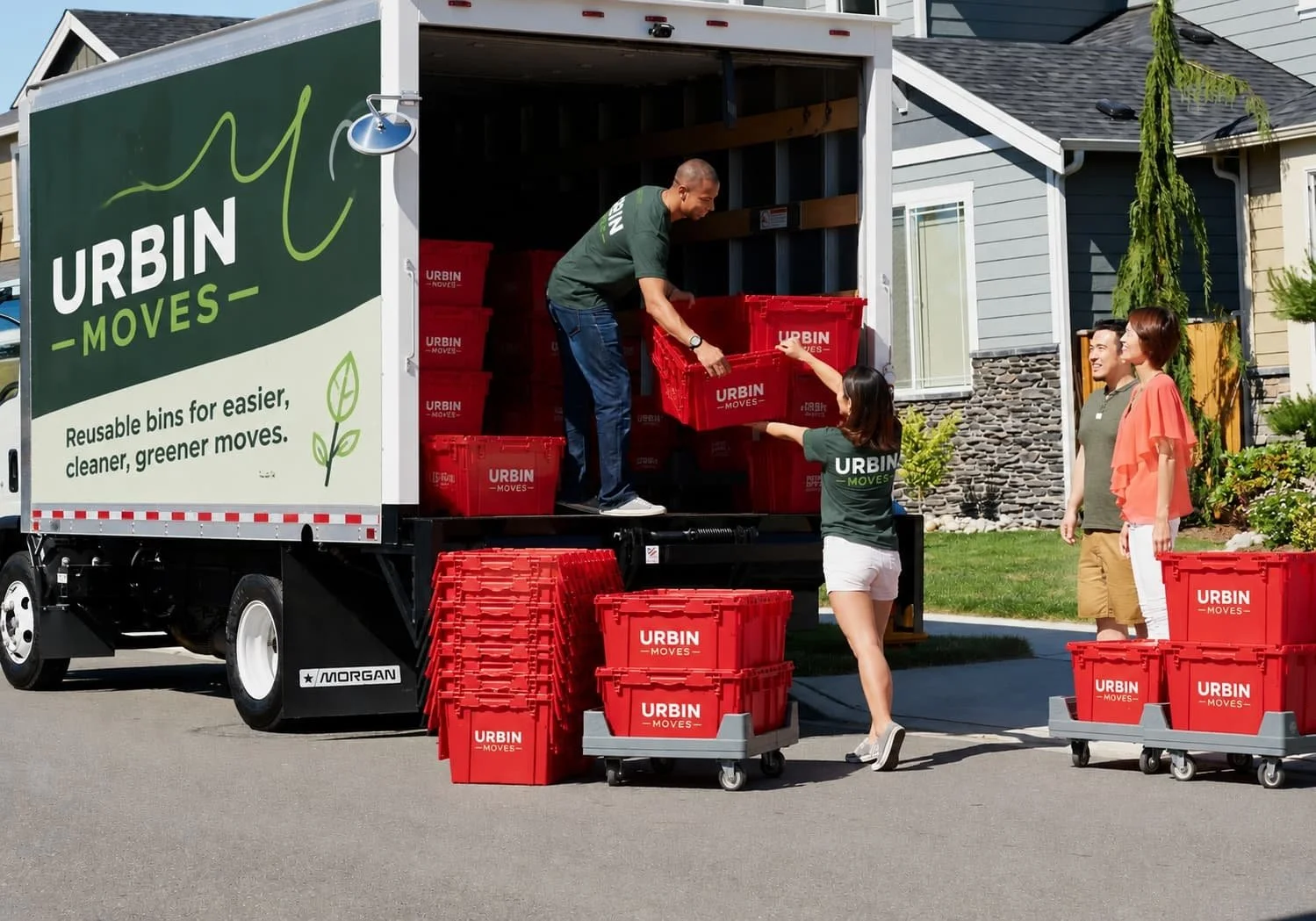 Urbin move workers dropping off bins outside a house