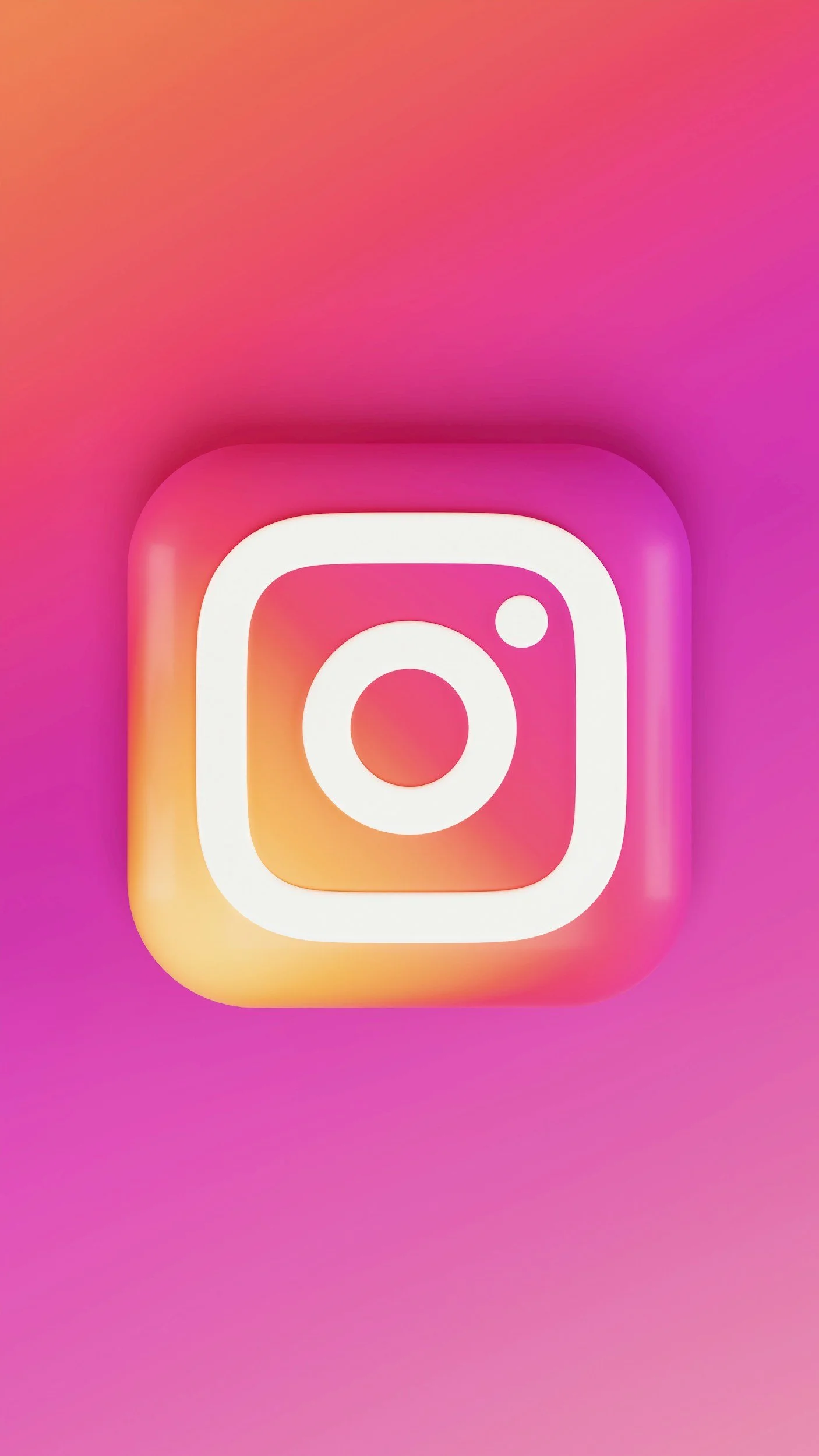 Instagram app icon with a colorful pink, orange, purple, and yellow gradient background.