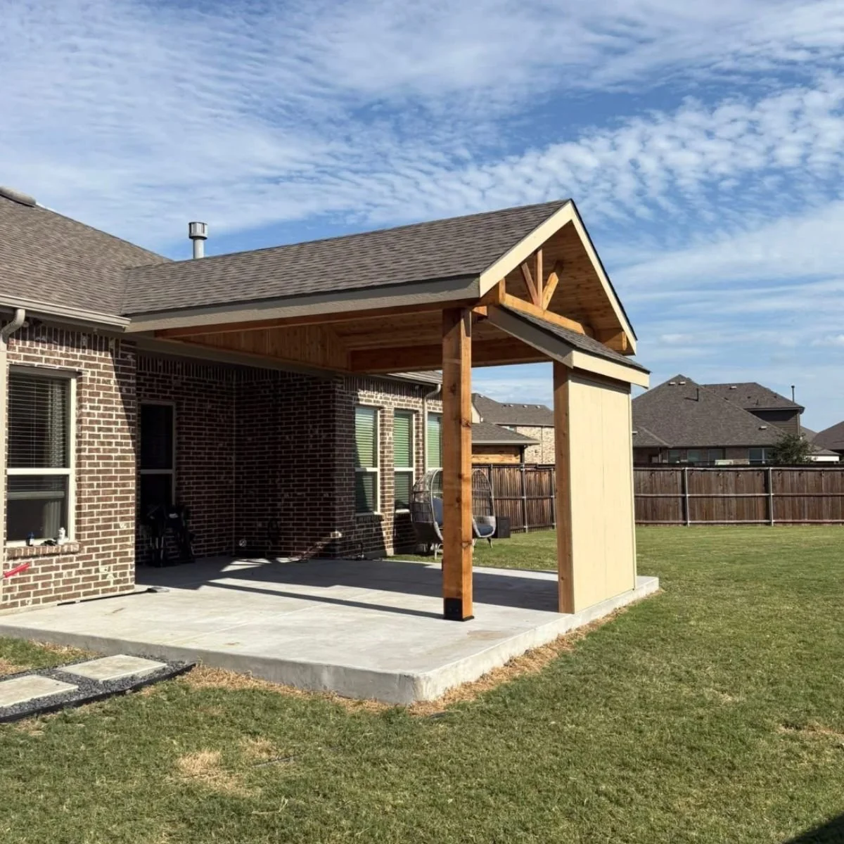 A patio addition shown on residential home.