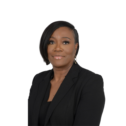 Professional woman with short black hair, wearing a black blazer and earrings, posing against a white background.