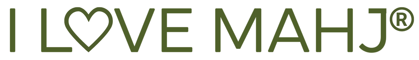 Text reading ‘Love’ with a heart symbol replacing the letter ‘O’. The words are in green and stylized font.