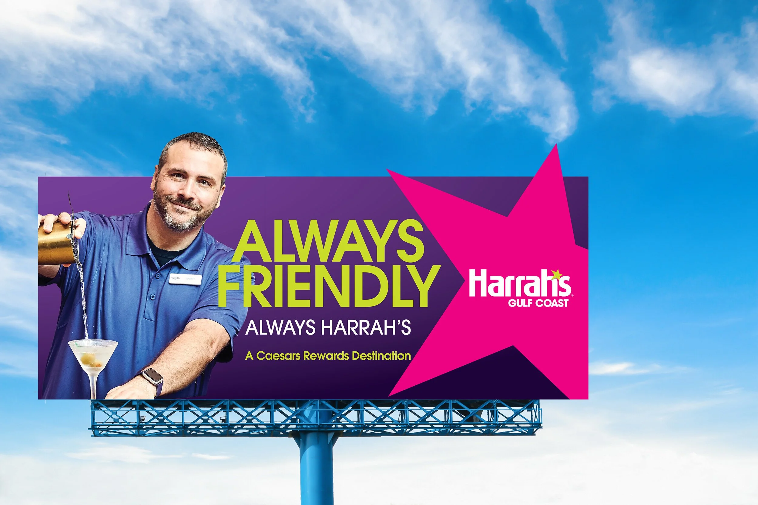 	Bartender pouring martini on Harrah's Gulf Coast billboard