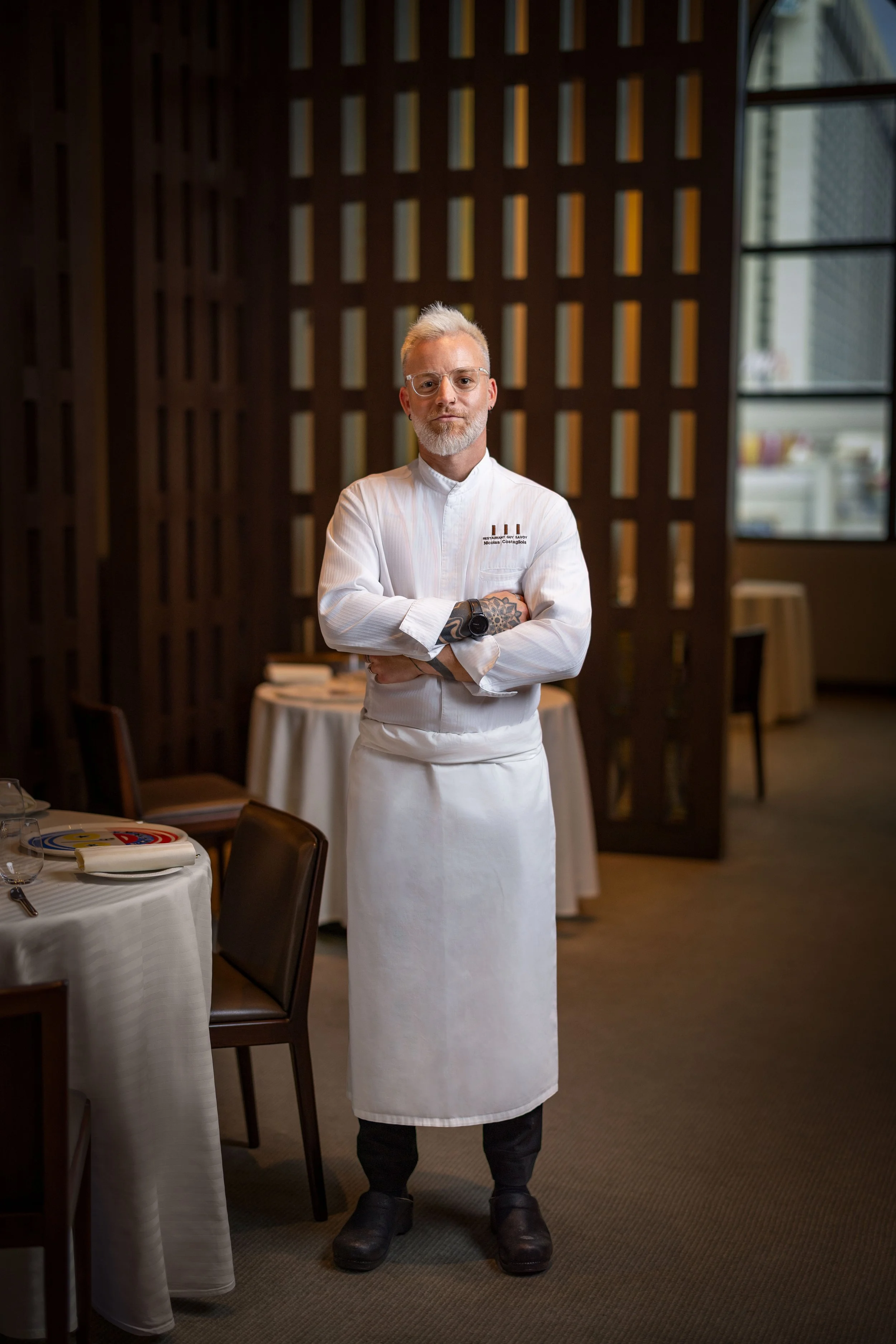 Chef Nicolas Costagliola stands in the dining room of Restaurant Guy Savoy at Caesars Palace