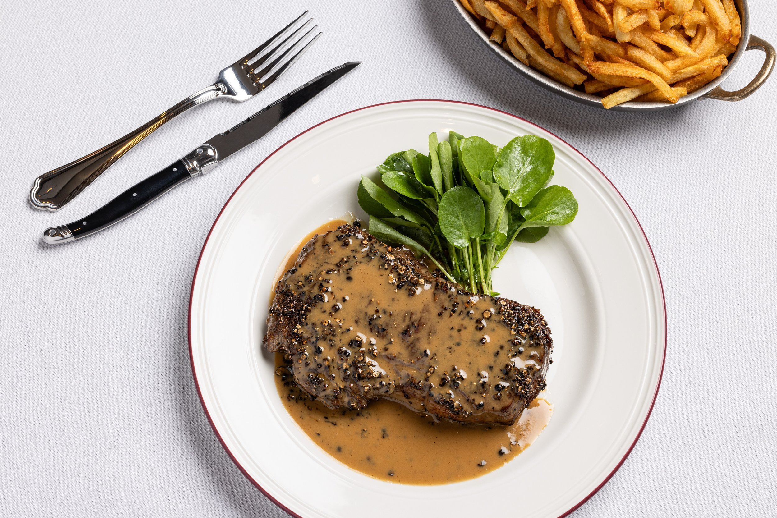 Emerils-Brasserie-Steak-Michael-Rudin.jpg