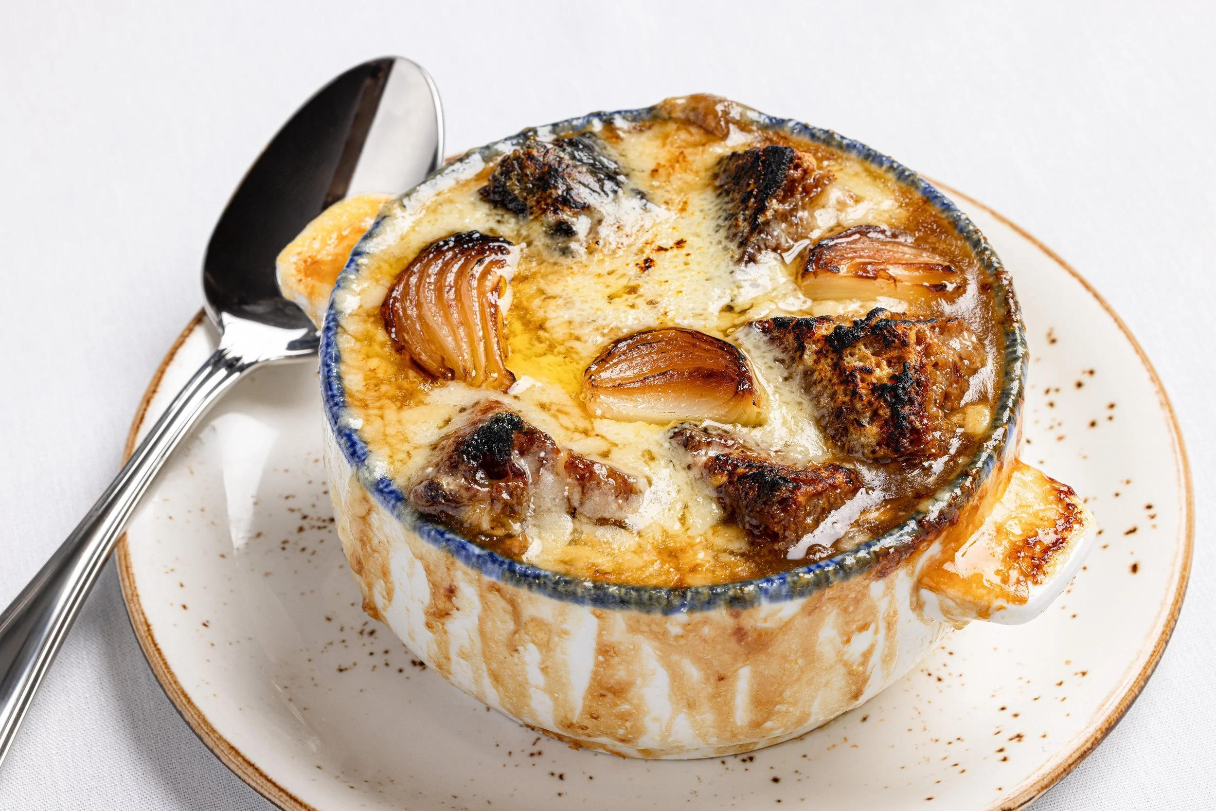 Emerils-Brasserie-Onion-Soup-Michael-Rudin.jpg