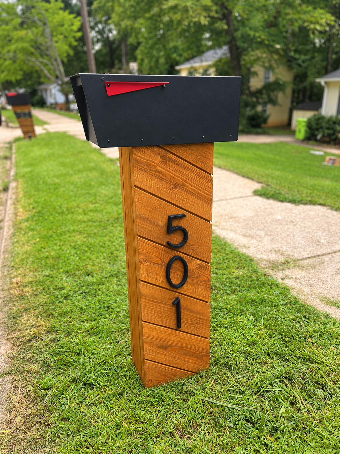 Modern Cedar Mailbox Post with 501 Numbers.png