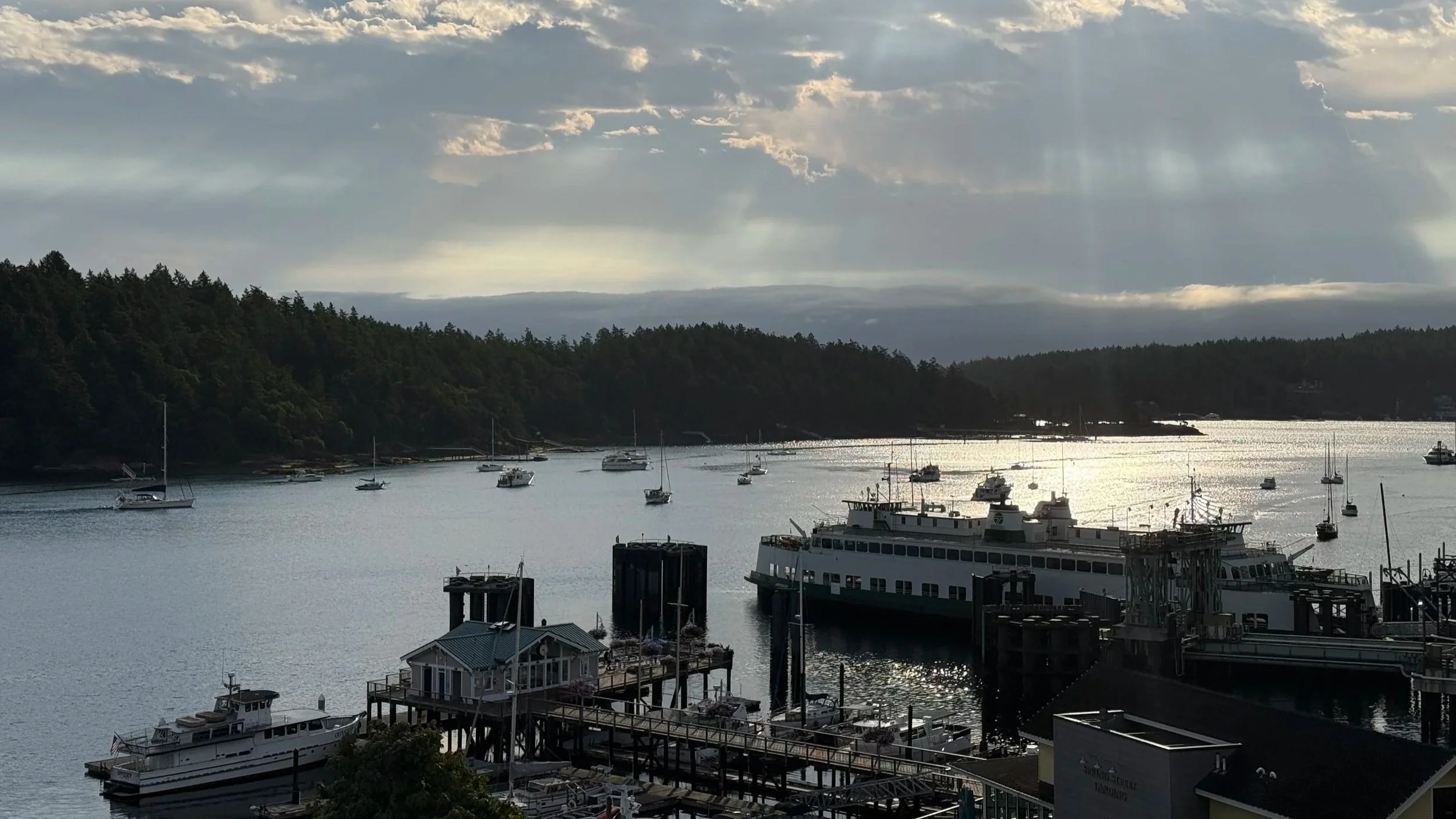 Sunrise view of Friday Harbor overlooking a WA ferry, docs and other ships