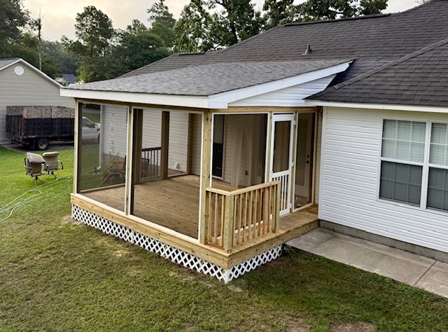Custom screened in porch addition built by Prime Home Improvements.