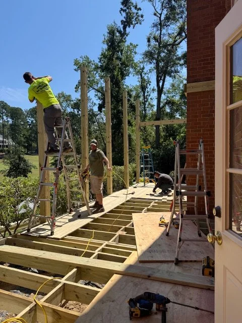 Prime Home Improvements crew building custom wood deck.