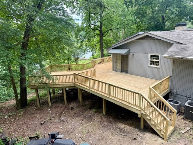 New custom pressure treated wood deck and stairs by Prime Home Improvements.