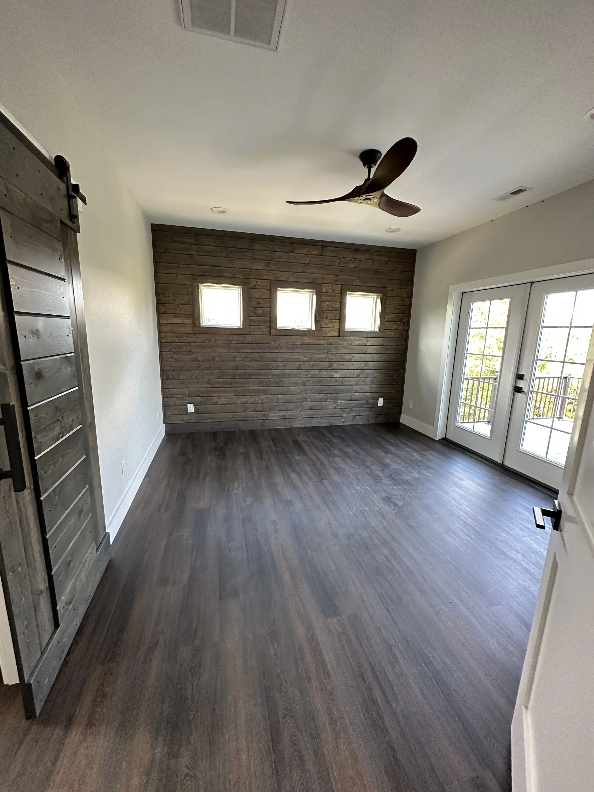 finished bedroom with paneling 