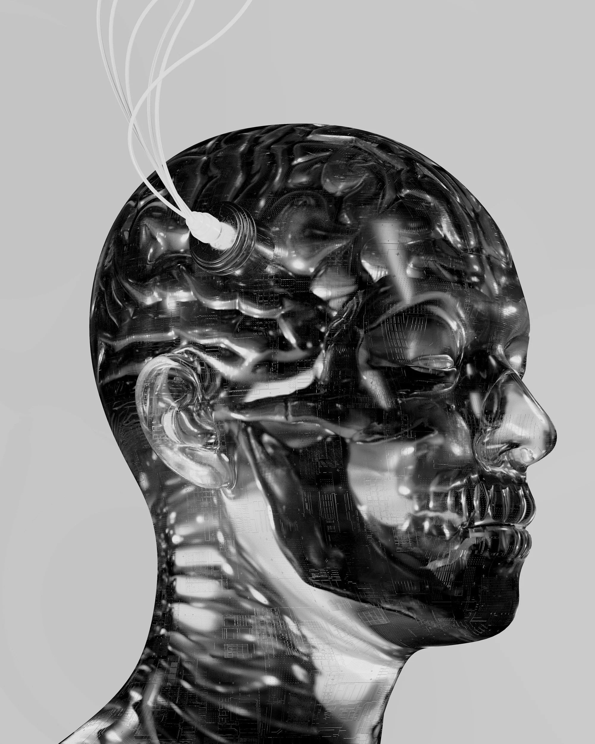 Digital rendering of a human head in profile, made of transparent circuitry and metallic components, with a glowing brain and connecting white wires extending from the top.