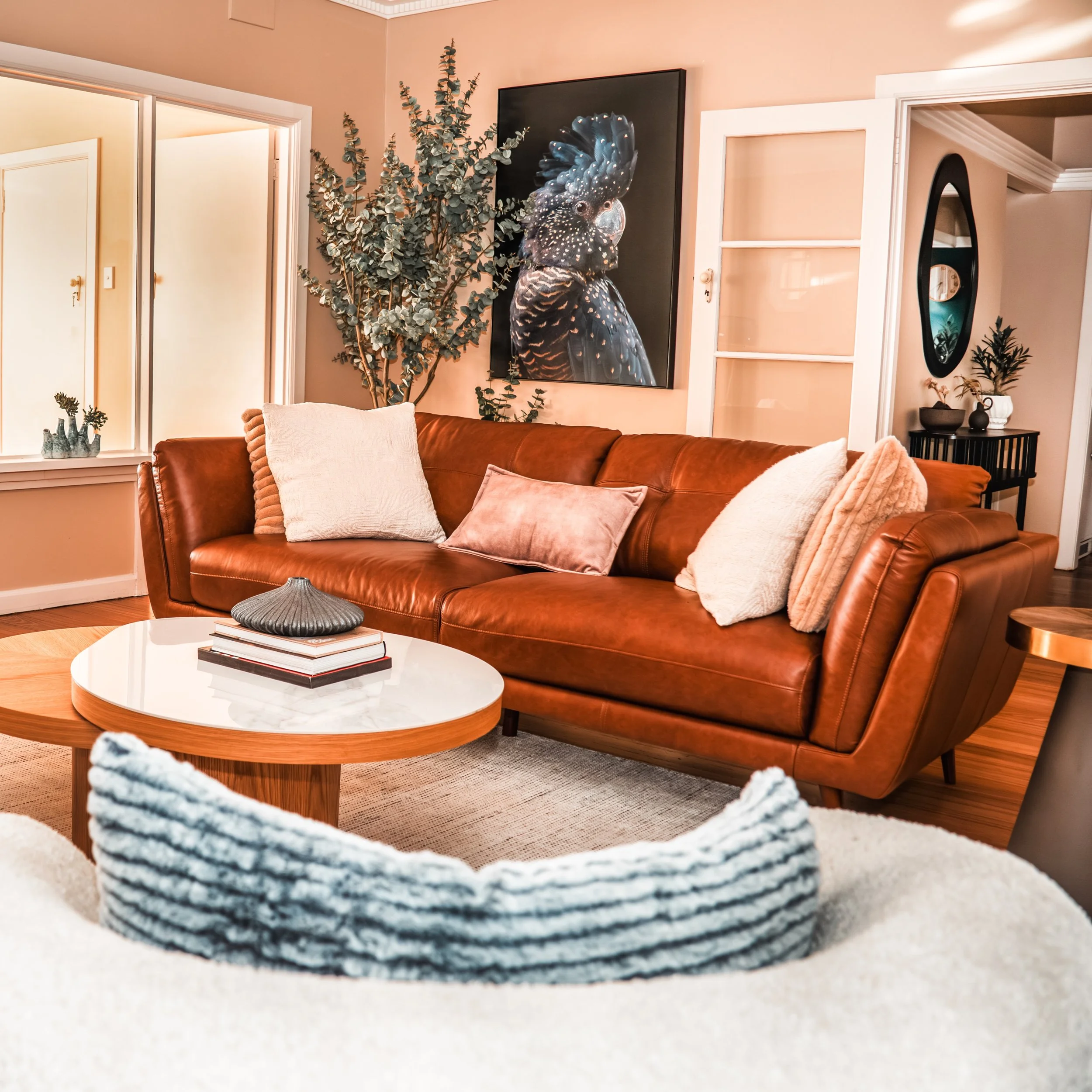 Five things we knew this room had to have. Swipe to see why. 🌿

1. A fireplace you can feel from across the room
2. A coffee table carved from a single tree root
3. Art books worth actually reading
4. Firewood stacked like sculpture
5. The kind of w