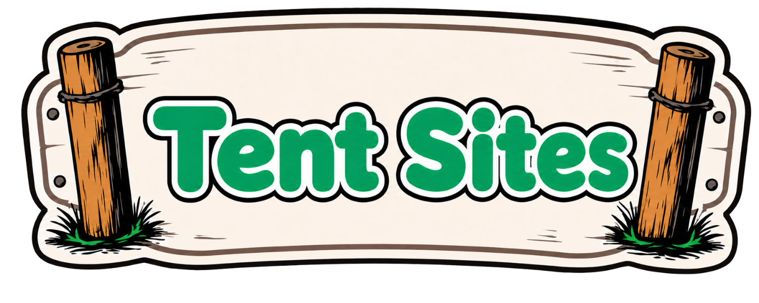 A sign with the words 'Tent Sites' written in large green letters, supported by two wooden posts with grass underneath.