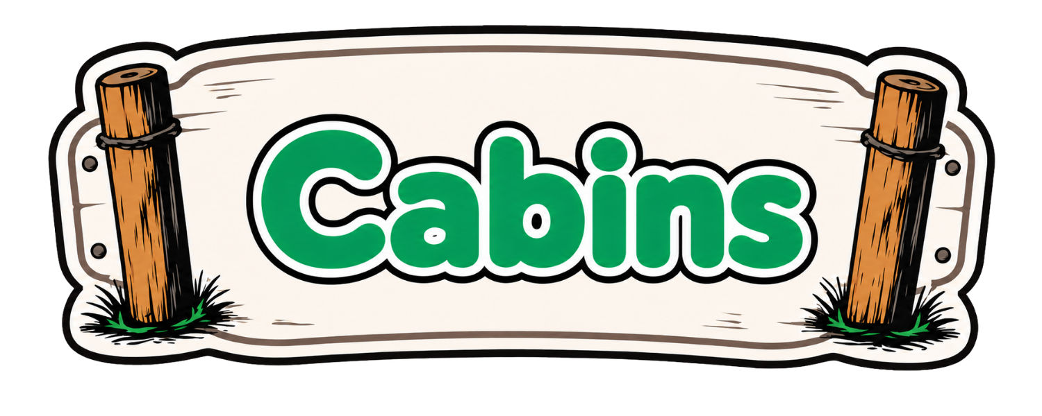 Sign with the word 'Cabins' in green letters, mounted on two wooden posts.