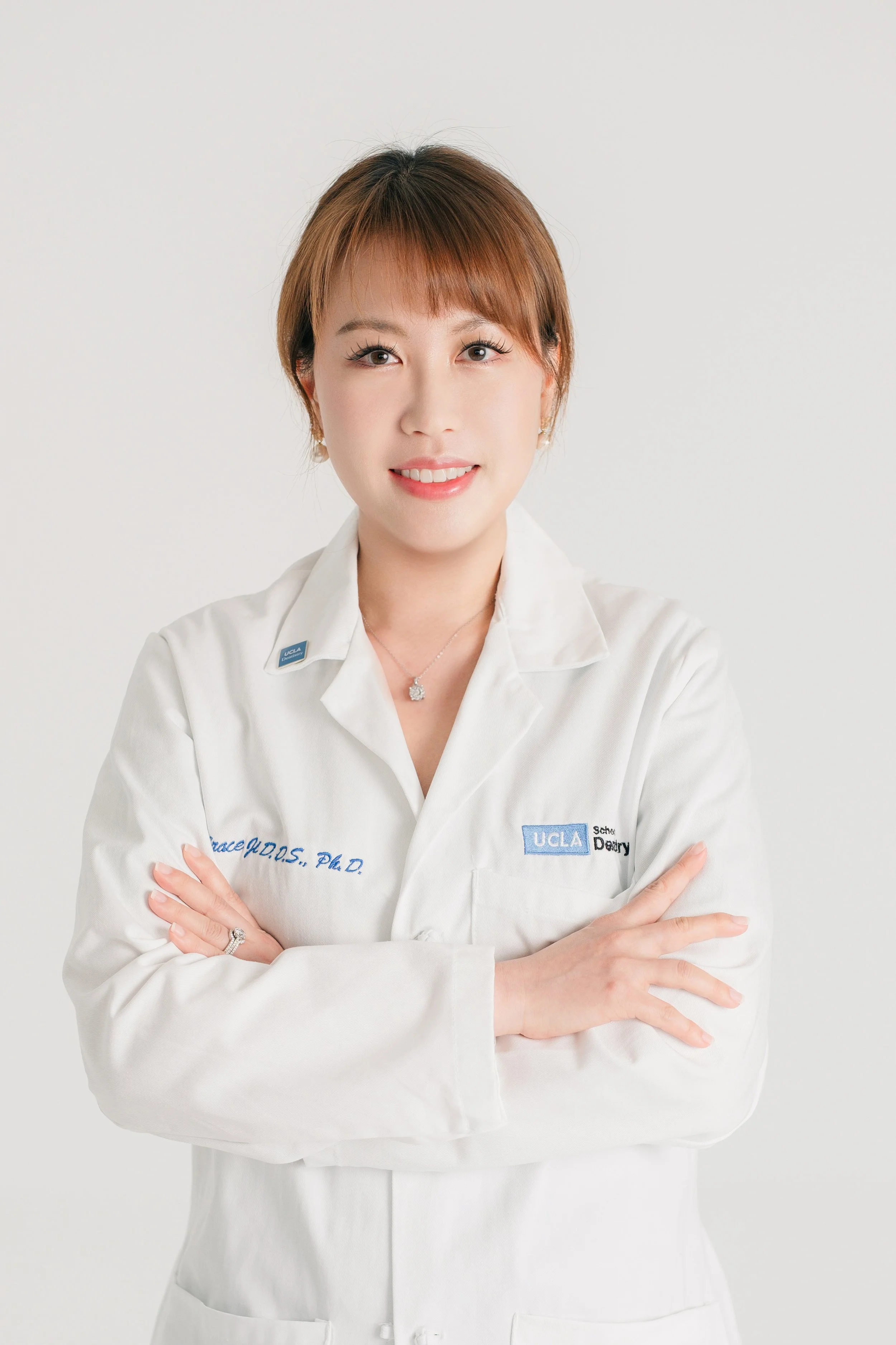 UCLA Female Dentist, DDS. PHD. MICOI, implantologist
